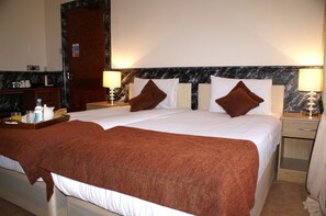 Twin Room | Premium bedding, blackout drapes, iron/ironing board, cribs/infant beds - Eaton Square Hotel (London)