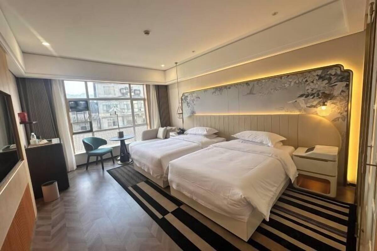 Premium bedding, down duvets, memory-foam beds, minibar