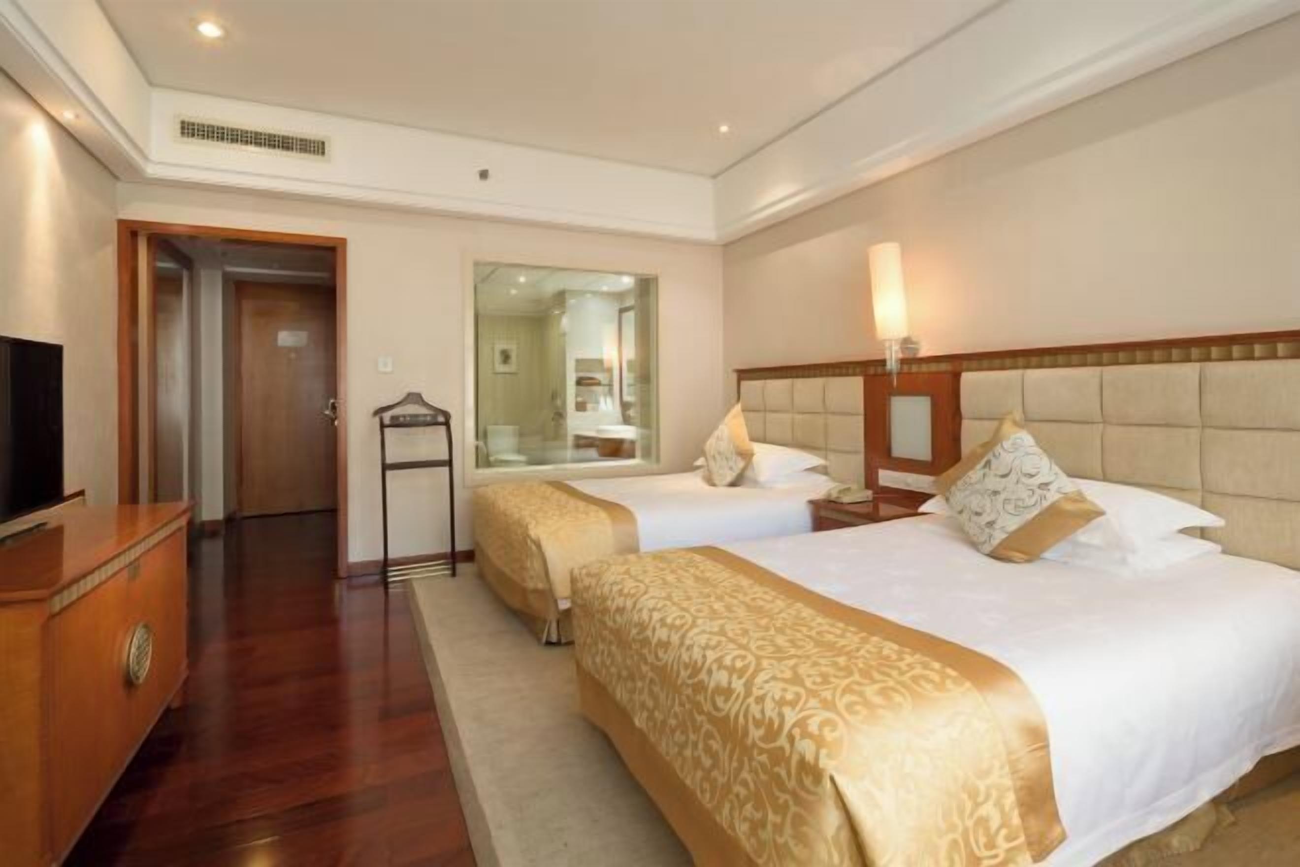 Premium bedding, down comforters, memory foam beds, minibar