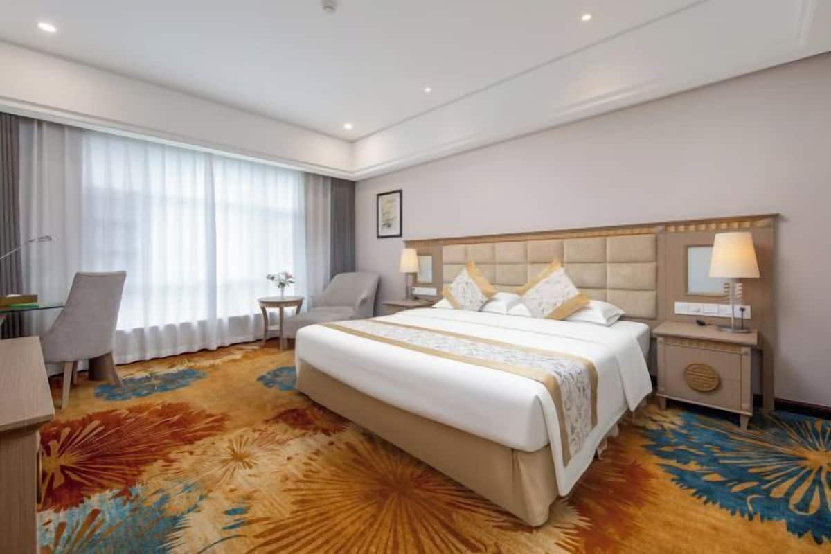 Premium bedding, down comforters, memory foam beds, minibar
