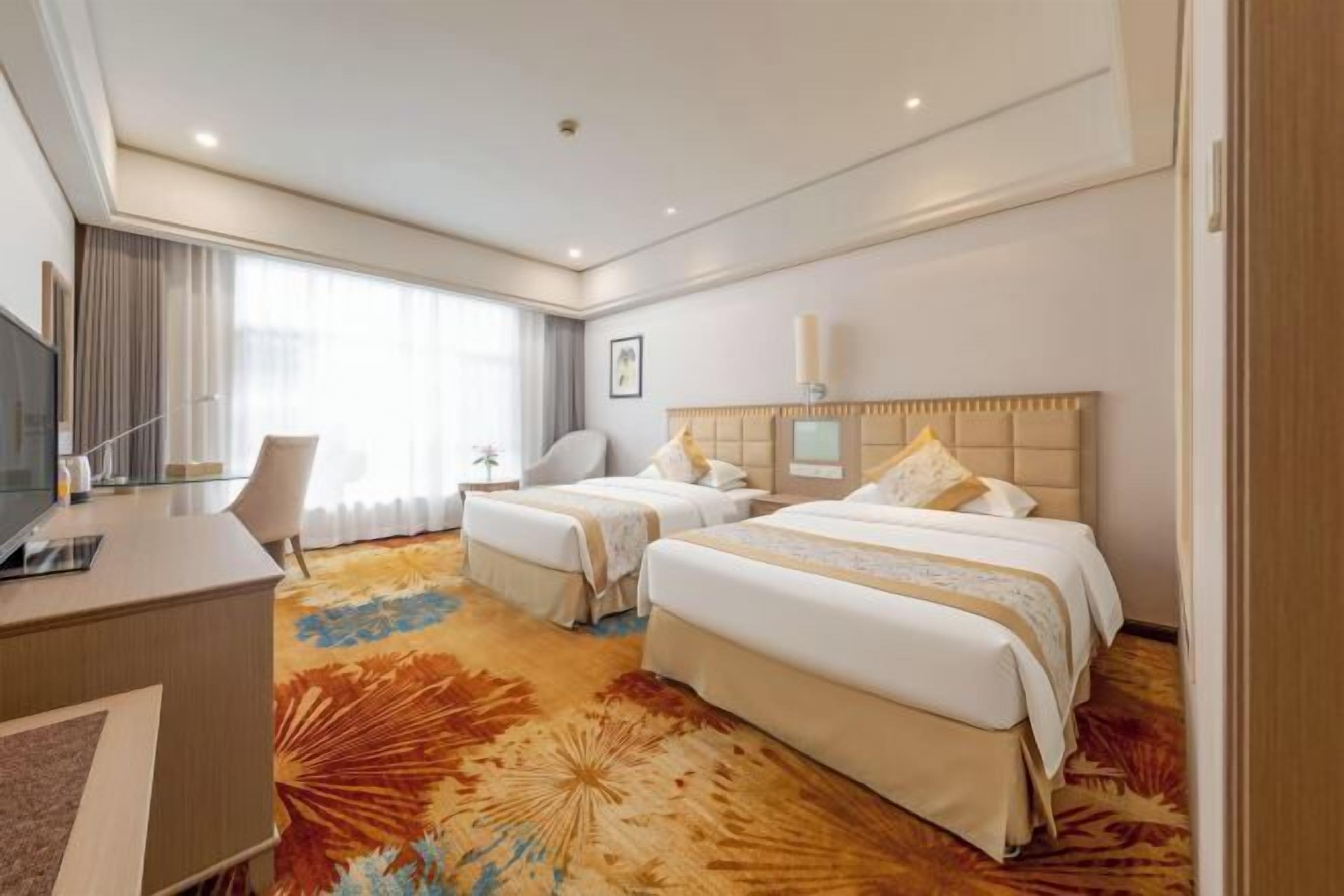 Premium bedding, down comforters, memory foam beds, minibar