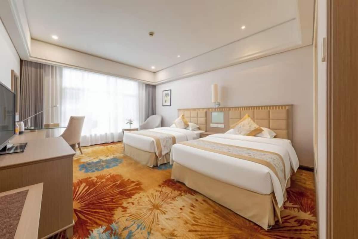 Premium bedding, down comforters, memory foam beds, minibar