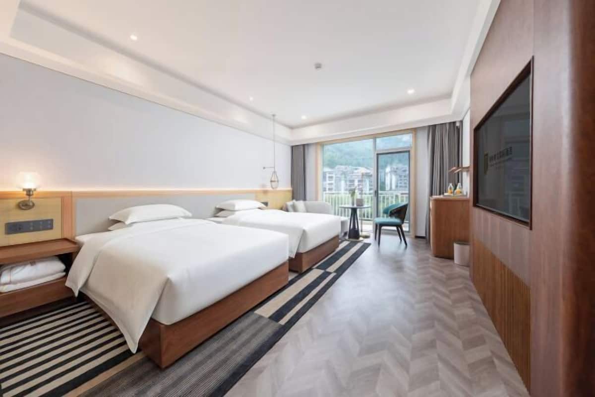 Premium bedding, down comforters, memory foam beds, minibar