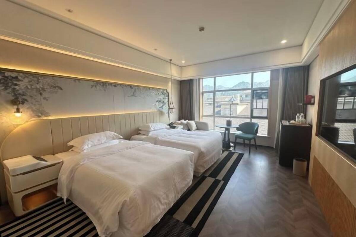 Premium bedding, down duvets, memory-foam beds, minibar