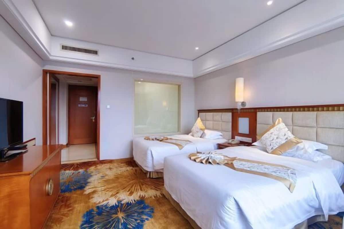 Premium bedding, down comforters, memory foam beds, minibar