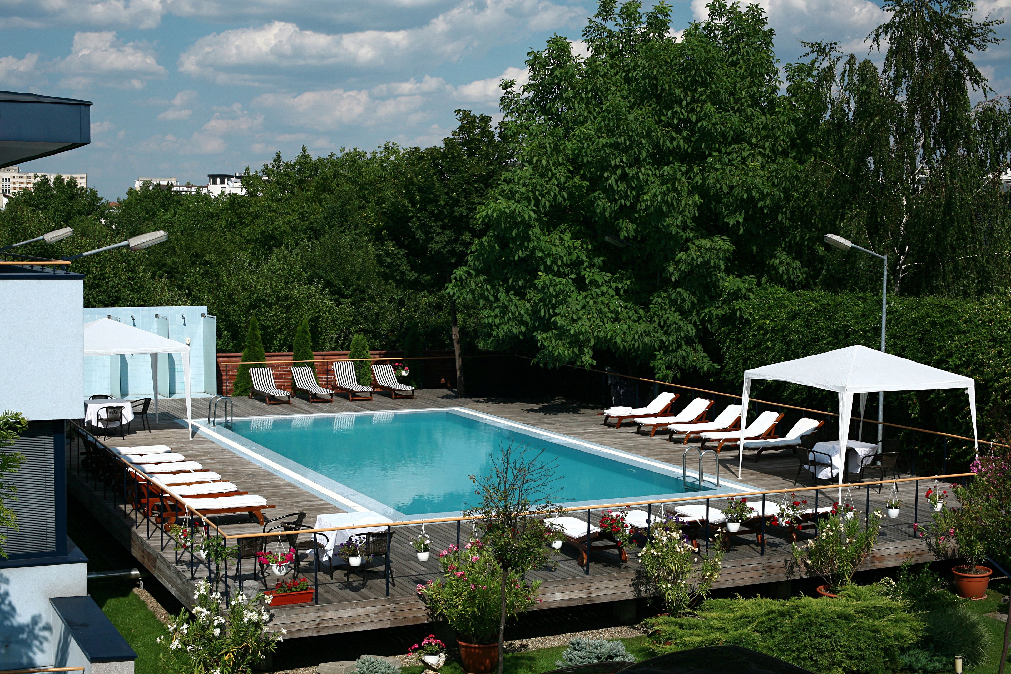outdoor pool, pool loungers