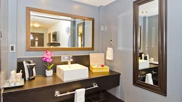 Shower, designer toiletries, hair dryer, bathrobes