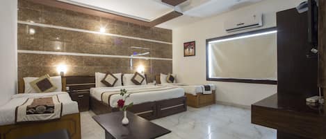 Family Room with Complimentary Railway Station Pickup. | In-room safe, free WiFi