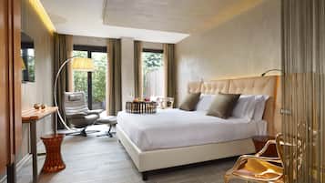 Ropa de cama de alta calidad, edredones de plumas, minibar y caja fuerte