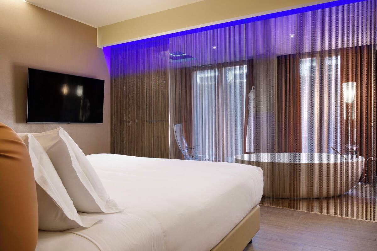 Junior Suite with Jacuzzi | Premium bedding, down comforters, minibar, in-room safe