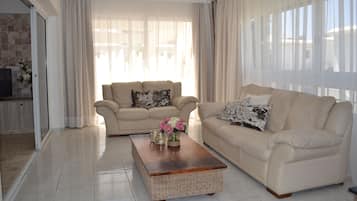 Suite, 3 Bedrooms | Living area | Flat-screen TV