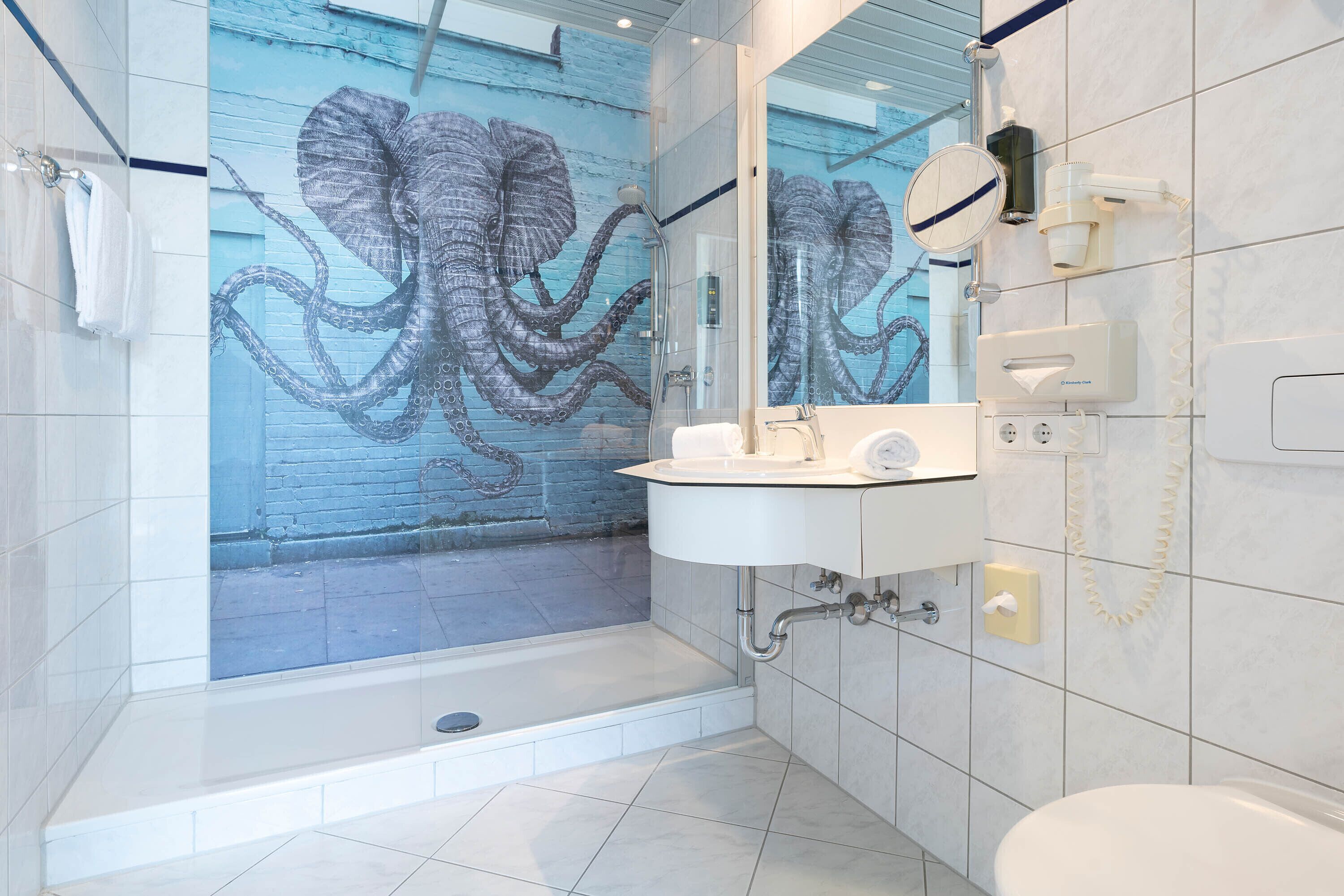 eco-friendly toiletries, hair dryer, towels, soap