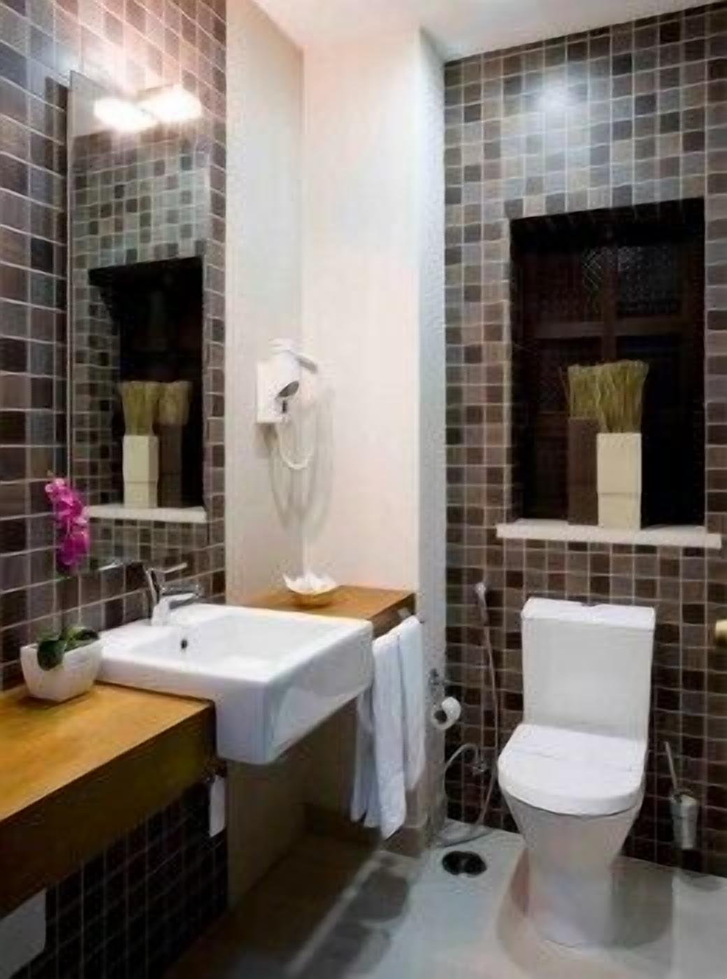 standard double room | bathroom | slippers, bidet, towels