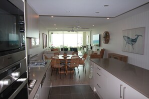 Two Bedroom Two Queen Apartment | Living area | 25-inch TV with digital channels - Kirra Surf Apartments (Coolangatta)