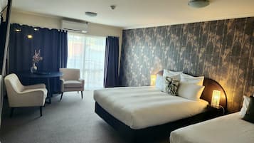 Economy Studio | 1 bedroom, premium bedding, minibar, in-room safe