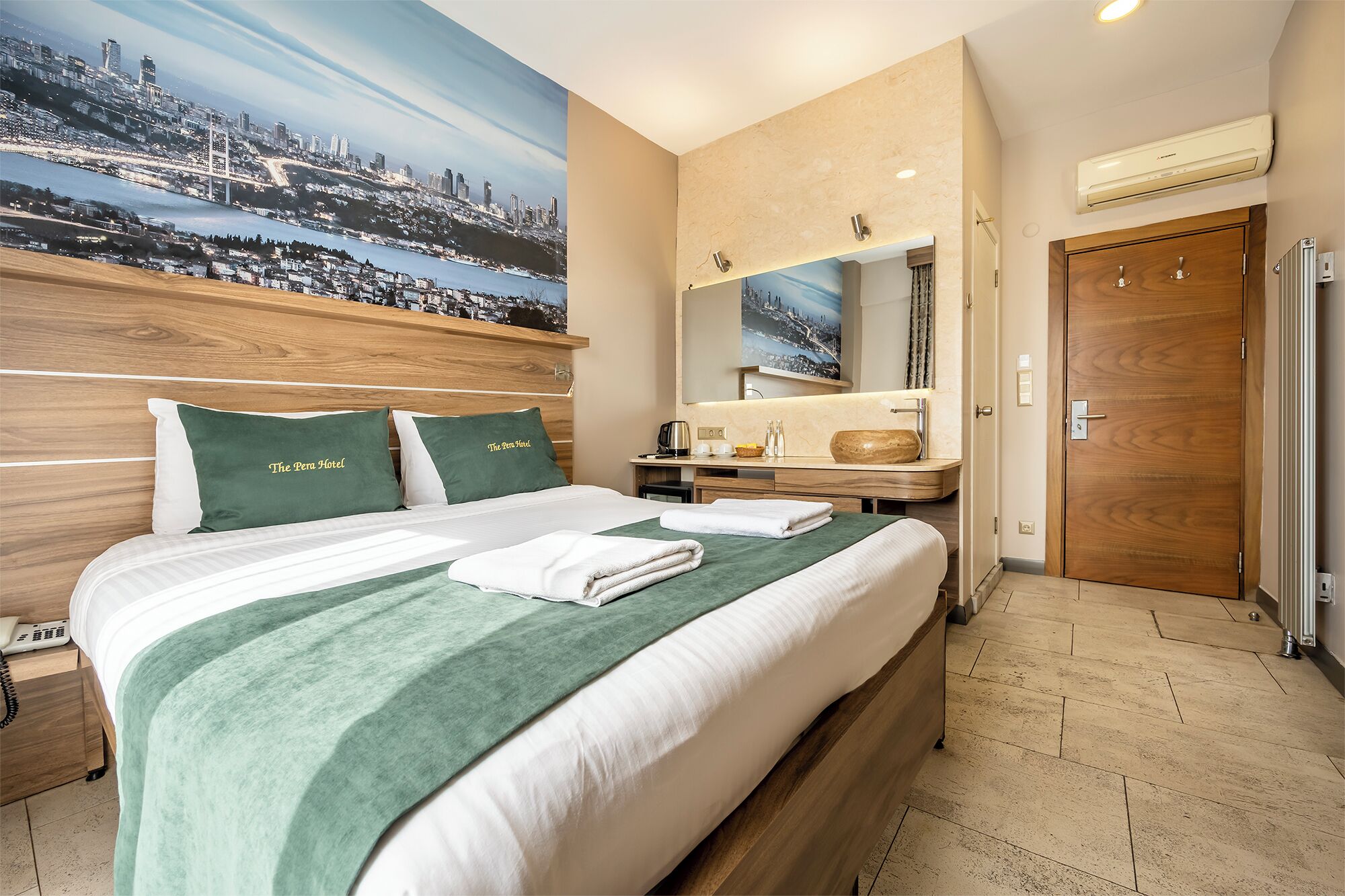 Premium bedding, down comforters, free minibar, in-room safe