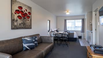 Suite, Multiple Beds | Living area