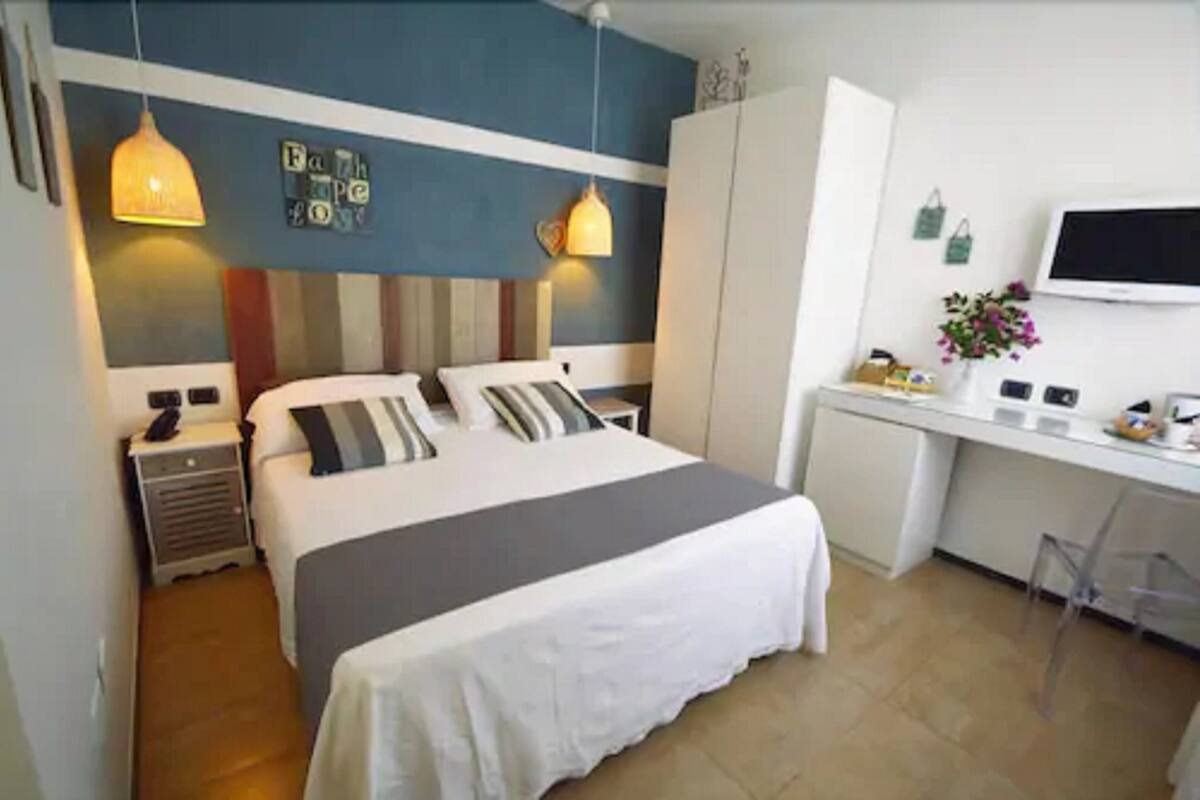 Down comforters, memory foam beds, minibar, in-room safe