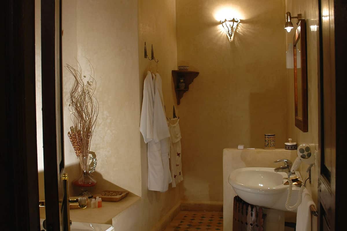 deluxe room | bathroom | hair dryer, bathrobes, slippers, bidet