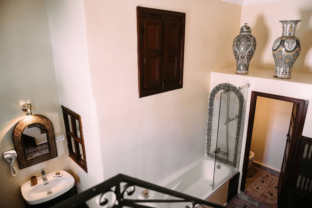 deluxe room | bathroom | hair dryer, bathrobes, slippers, bidet