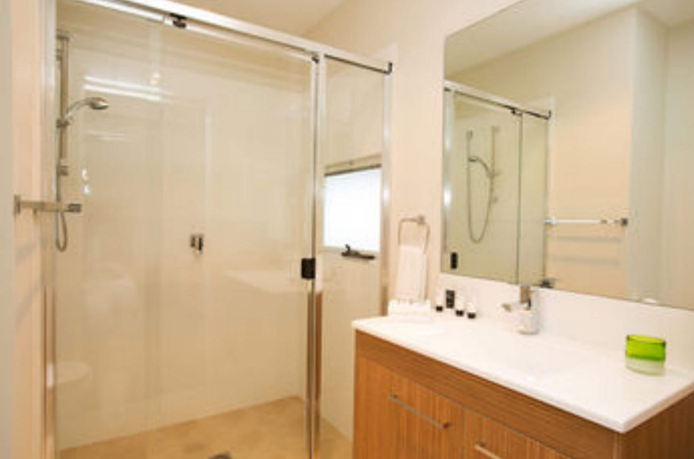 designer toiletries, hair dryer, towels, soap