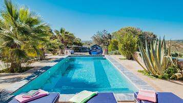 Outdoor pool, pool umbrellas, pool loungers