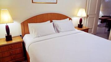 Suite, 1 habitación | Ropa de cama de alta calidad y colchones con acolchado adicional