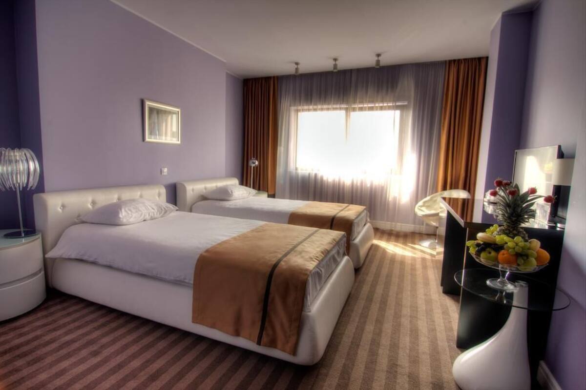 deluxe twin room | 1 bedroom, minibar, in-room safe, desk