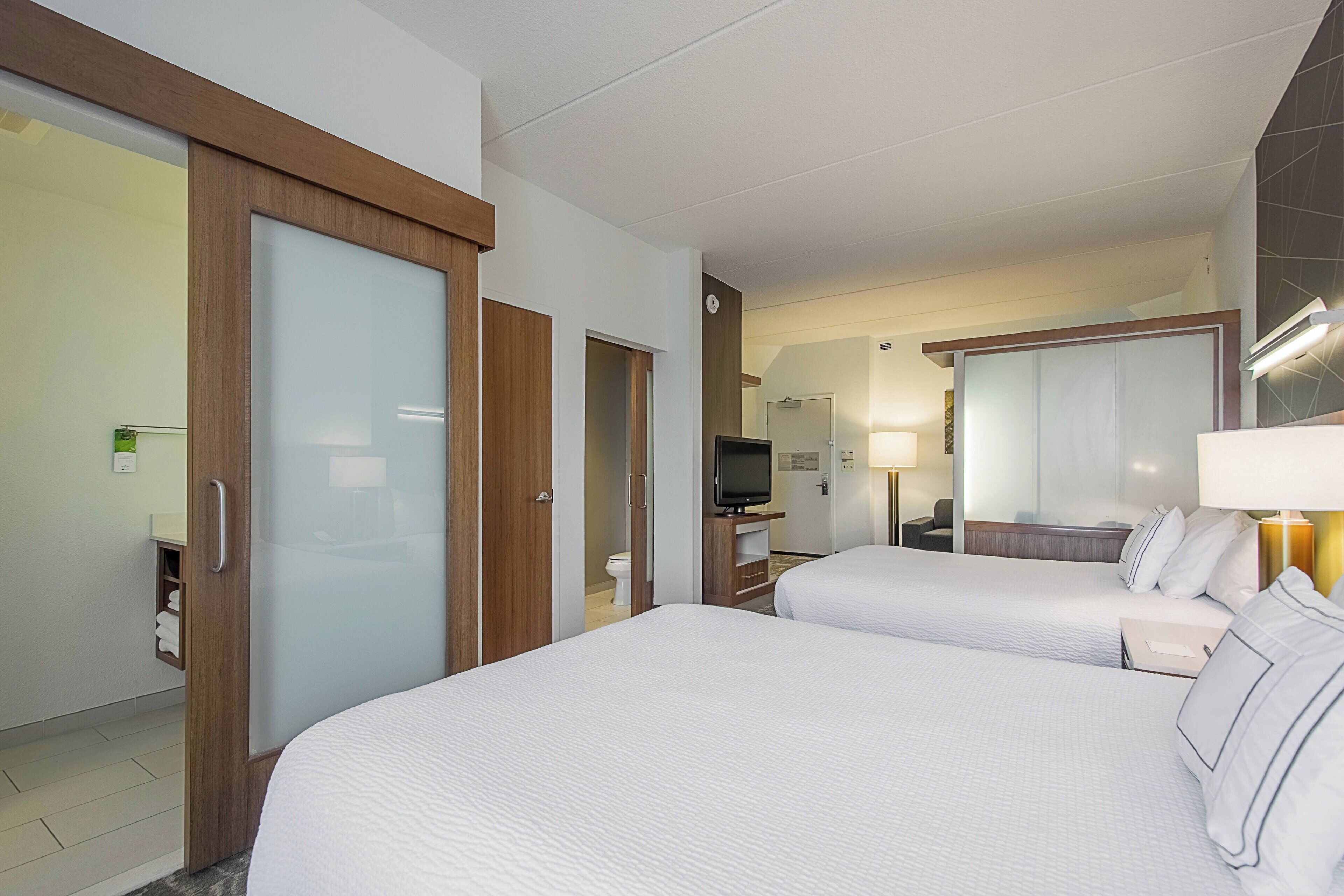 suite, multiple beds | hypo-allergenic bedding, down duvets, in-room safe, desk