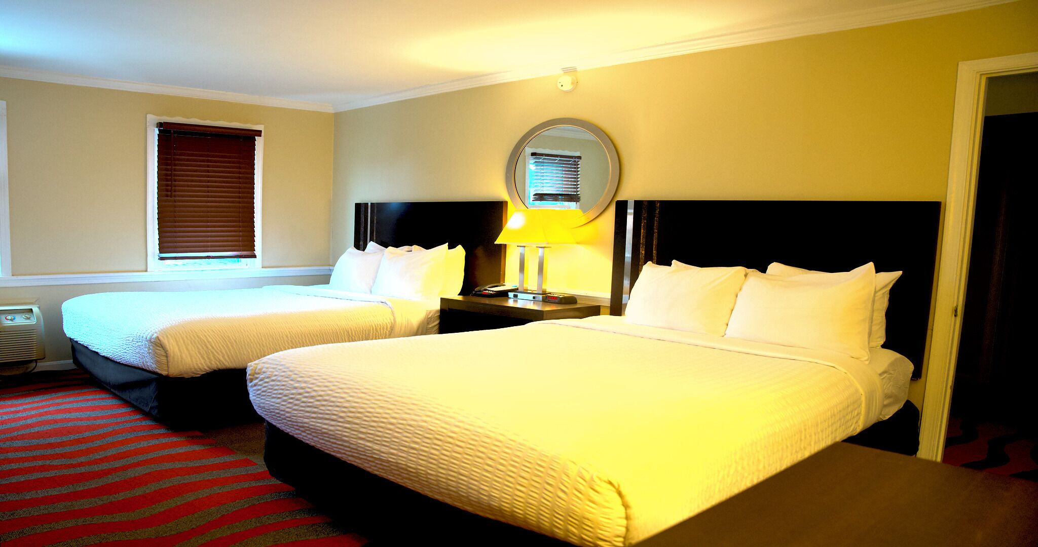 Premium bedding, pillow-top beds, in-room safe, desk