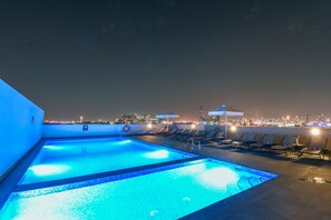 Outdoor pool, open 8:00 AM to 8:00 PM, pool umbrellas, pool loungers - Premier Inn Dubai International Airport (Dubai)