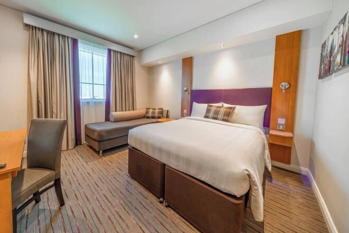 Premium bedding, pillow-top beds, in-room safe, desk