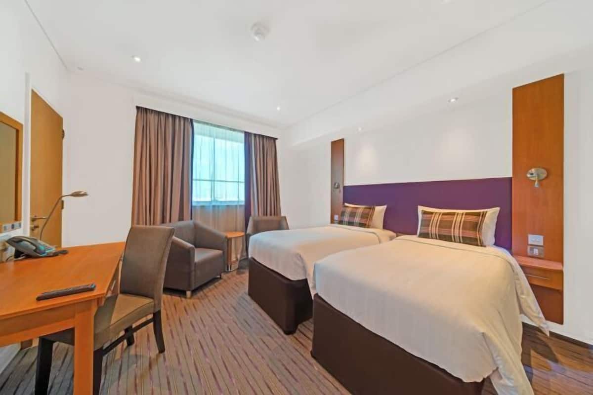 Premium bedding, pillow-top beds, in-room safe, desk