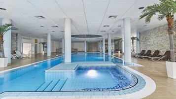 Indoor pool, open 7:00 AM to 10:00 PM, lifeguards on site