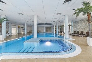 Indoor pool, open 7:00 AM to 10:00 PM, lifeguards on site