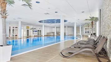 Indoor pool, open 7:00 AM to 10:00 PM, lifeguards on site