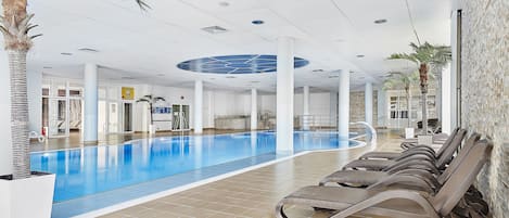 Indoor pool, open 7:00 AM to 10:00 PM, lifeguards on site