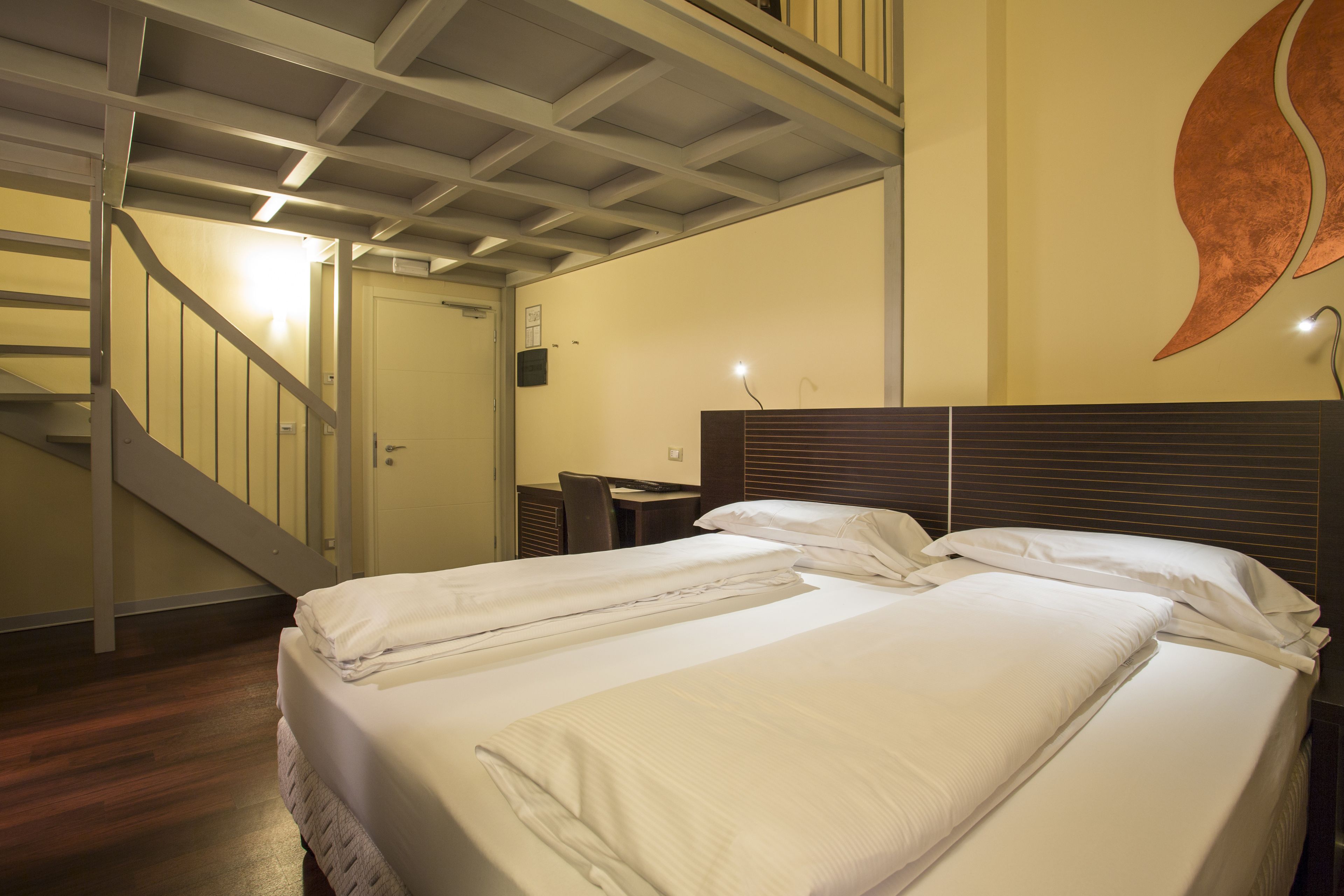 deluxe quadruple room | 1 bedroom, premium bedding, select comfort beds, minibar