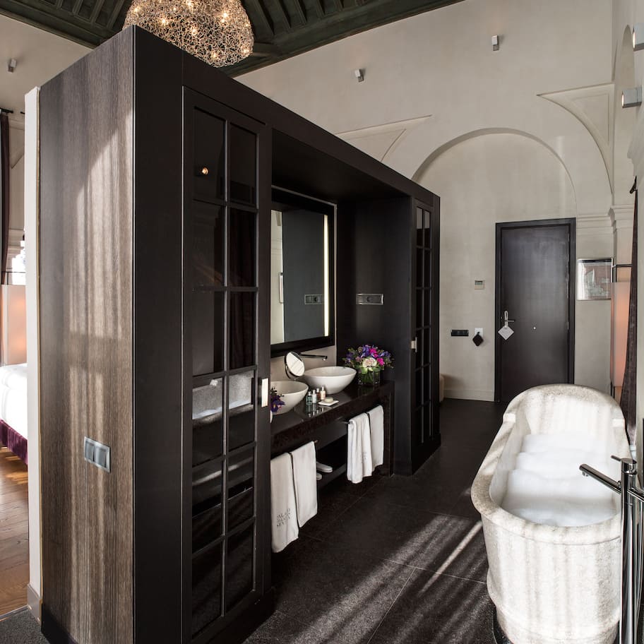 Suite | Bathroom | Designer toiletries, hair dryer, bathrobes, slippers