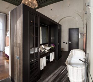 Suite | Bathroom | Designer toiletries, hair dryer, bathrobes, slippers