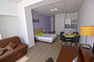 Superior Studio | Desk, blackout drapes, iron/ironing board (on request), cribs (free)