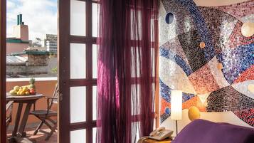 Suite, 1 Queen Bed | In-room safe, soundproofing, iron/ironing board, free cribs/infant beds