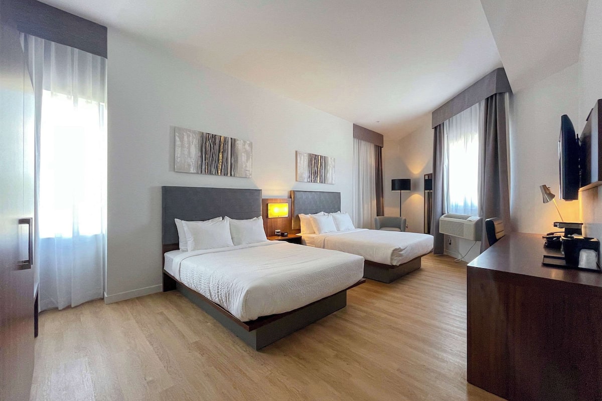 deluxe room, 2 queen beds, non smoking (no pets allowed) | individually furnished, desk, laptop workspace, blackout curtains