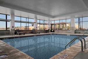 Indoor pool, open 6:00 AM to 10:00 PM, pool loungers