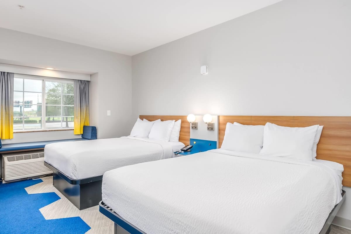 Standard Room, 2 Queen Beds | In-room safe, desk, laptop workspace, blackout drapes