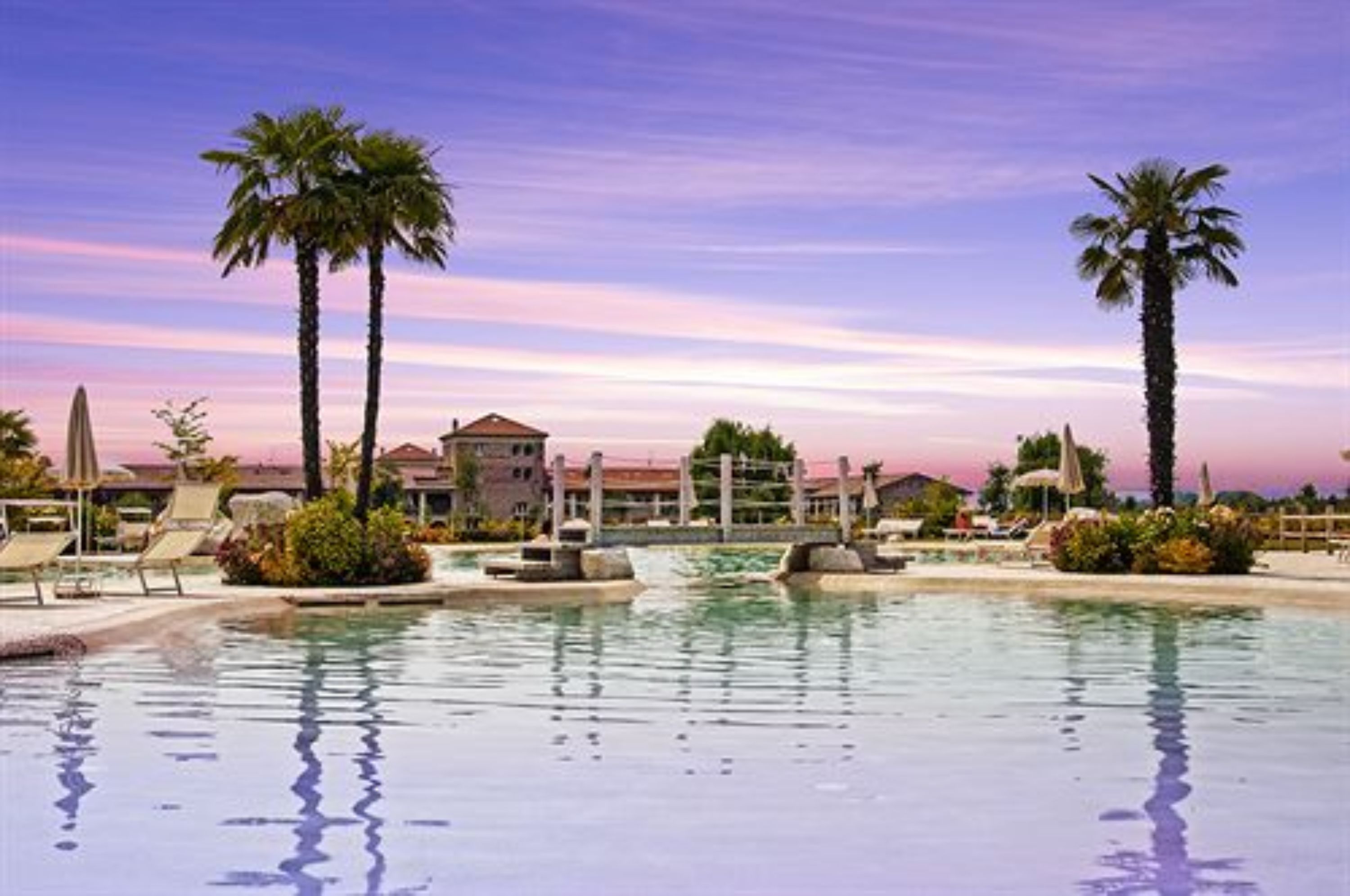 indoor pool, 2 outdoor pools, pool umbrellas, pool loungers