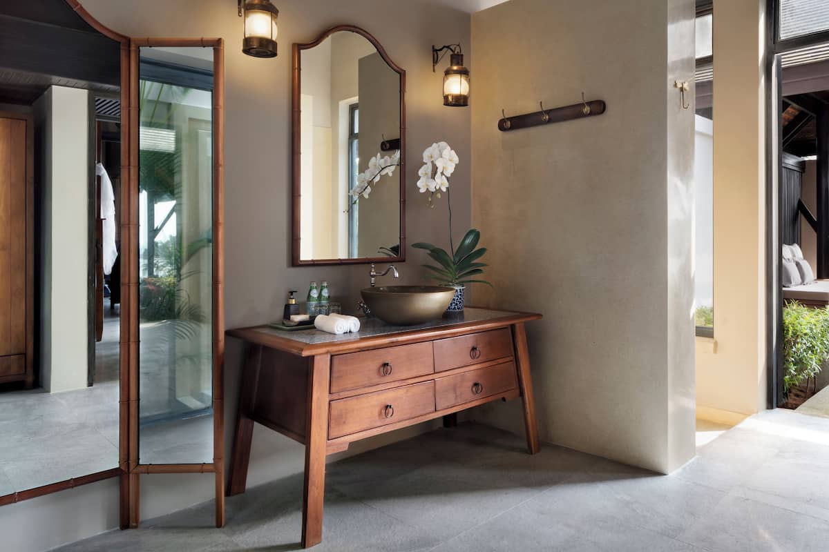 Designer toiletries, hair dryer, bathrobes, slippers