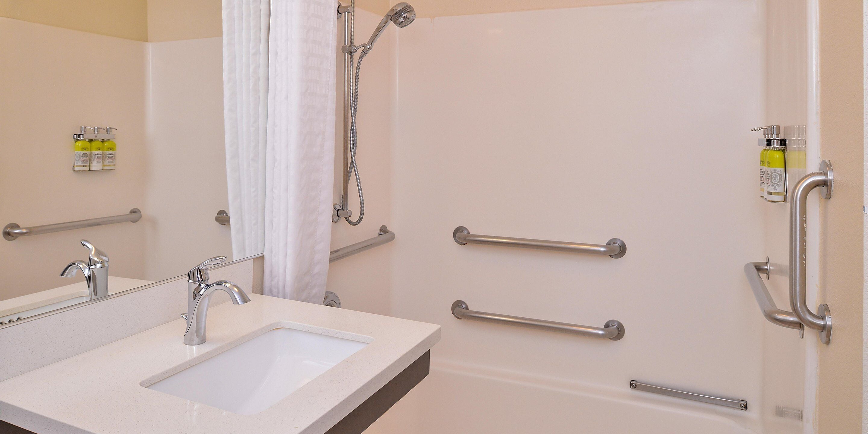 combined shower/bathtub, free toiletries, hair dryer, towels