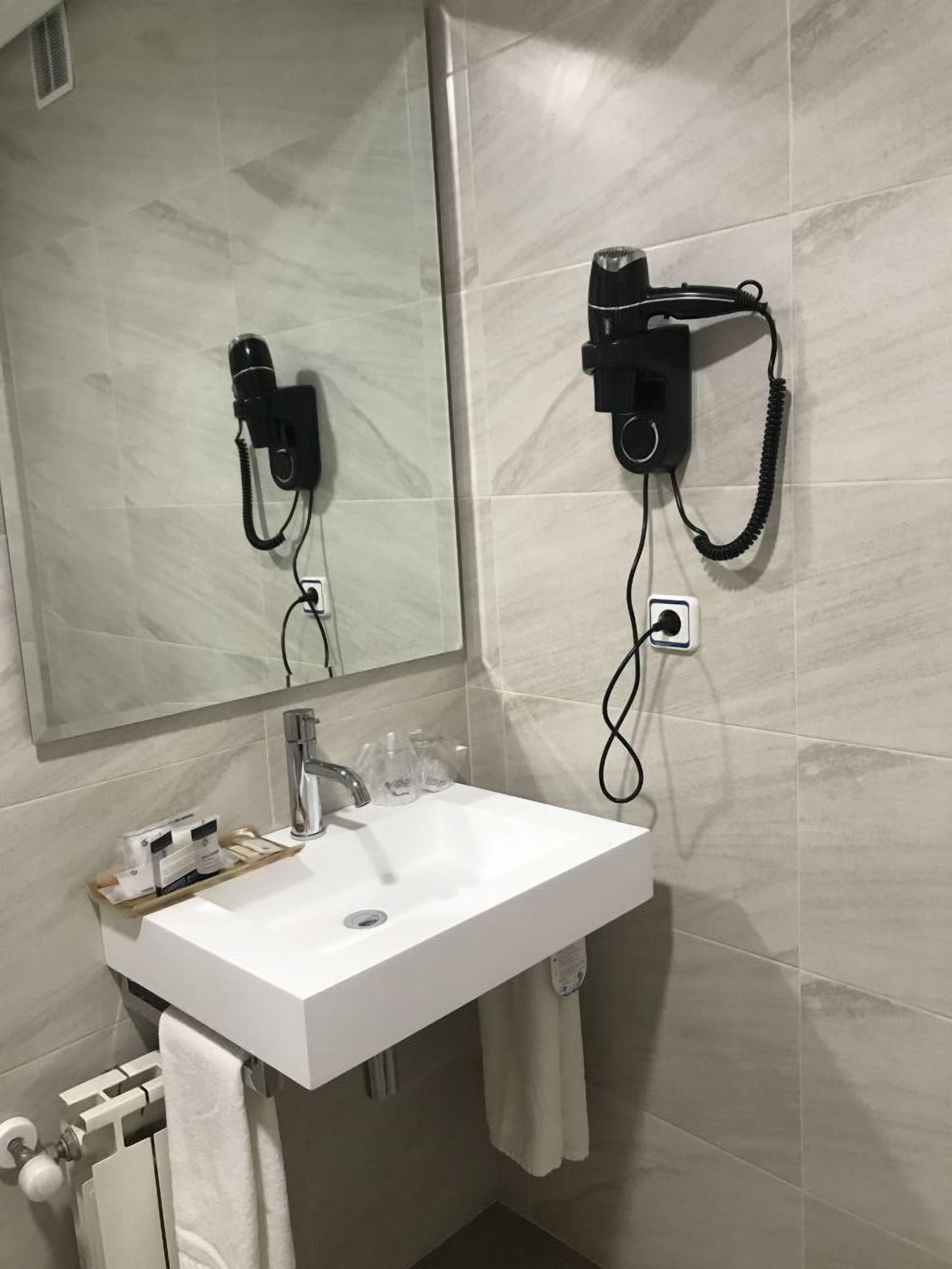 standard double or twin room | bathroom | free toiletries, hair dryer, towels, soap