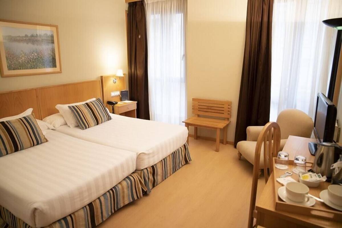 Apartemen Ekonomi, 1 kamar tidur | Meja kerja, ruang kerja ramah laptop, kedap suara, dan Wi-Fi gratis